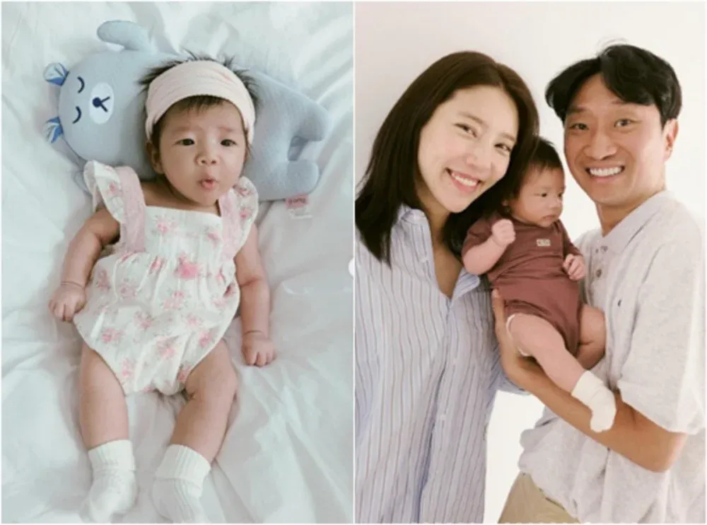 सोन डैम बी तीन लोगों के खुशहाल परिवार के रूप में बेबी हेई के साथ 50 दिन का जश्न मनाता है