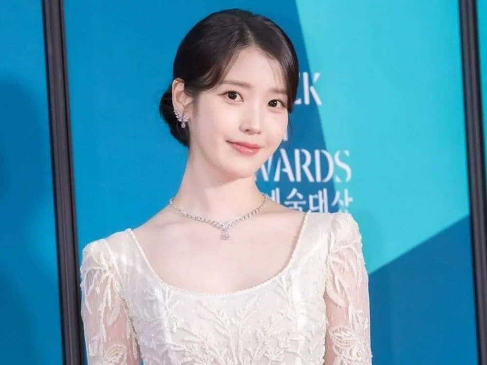 IU parle de tailleur